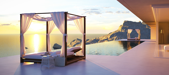 Luxueus hotel met romantisch uitzicht over de zee bij zonsondergang